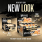 Warrior Crunch White Chocolate protein bar retail display graphic comparing the old 'White Chocolate Crisp' design box and the new 'Soft Core' design box, with the text 'You may receive either design'.