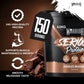 A 4.5kg tub of Warrior Serious Protein Chocolate Milkshake flavor, shown alongside promotional text highlighting 24g high-quality protein, 150 servings, muscle support, and smooth milkshake taste, with chocolate chunks in the background.