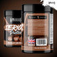 Two black tubs of Warrior Series Protein Chocolate Milkshake powder shown on a dark brown background, with one tub displaying the front label and the other showing the back label.